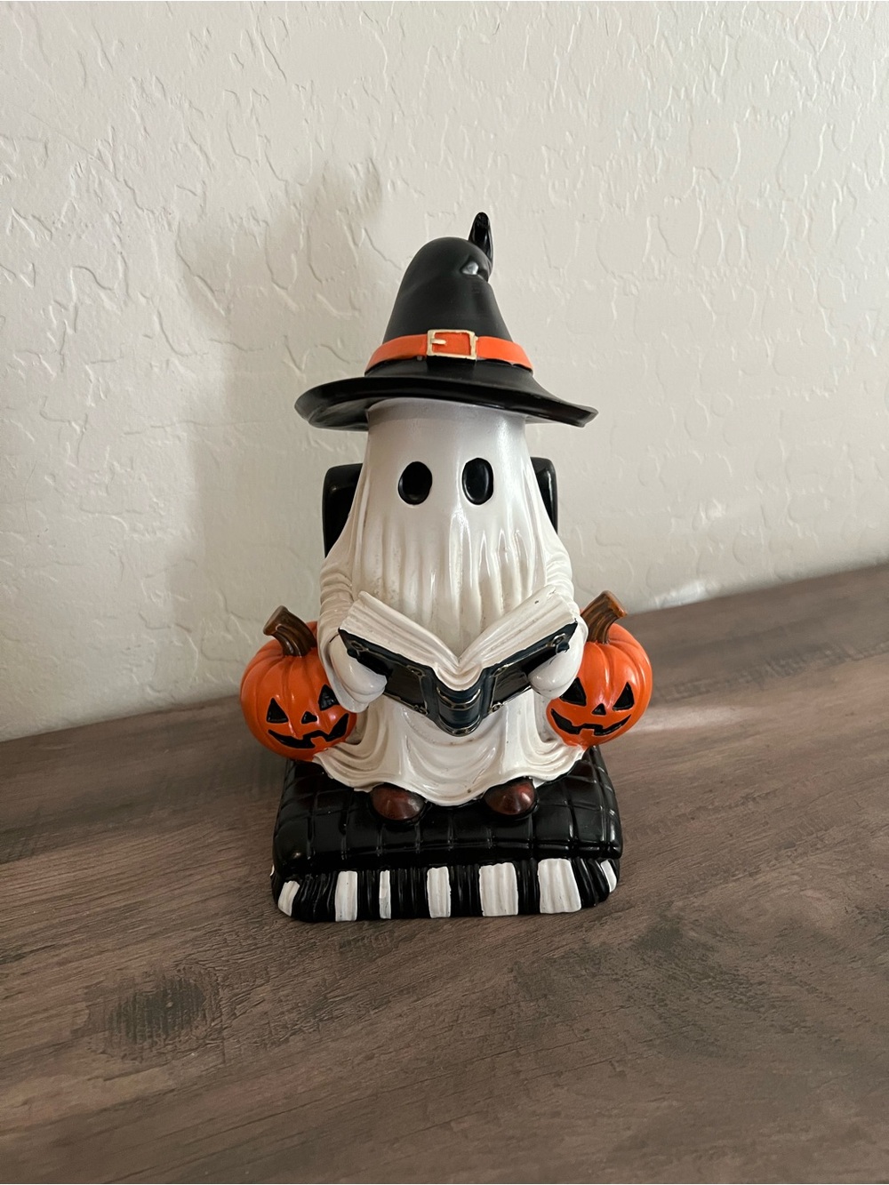Halloween Ghost Figurine Reading Book in Chair with Pumpkins and Witch Hat